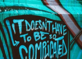 teal and white graffiti wall
