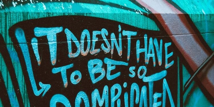 teal and white graffiti wall