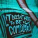 teal and white graffiti wall